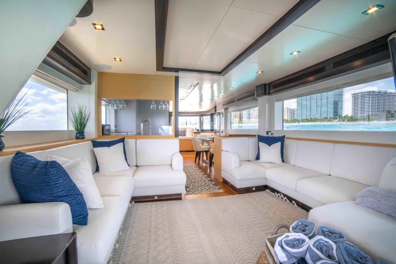 Slide: The Image of Luxurious interior of 2018 Sirena 64 yacht with white sofas and ocean view. - 32
