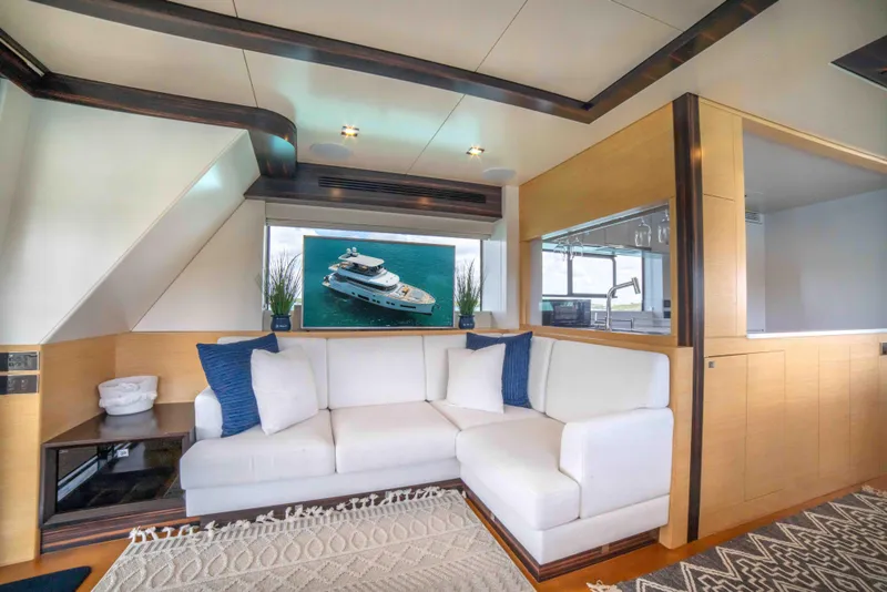 Slide: The Image of Luxurious interior of 2018 Sirena 64 yacht with white sofa and ocean view. - 34