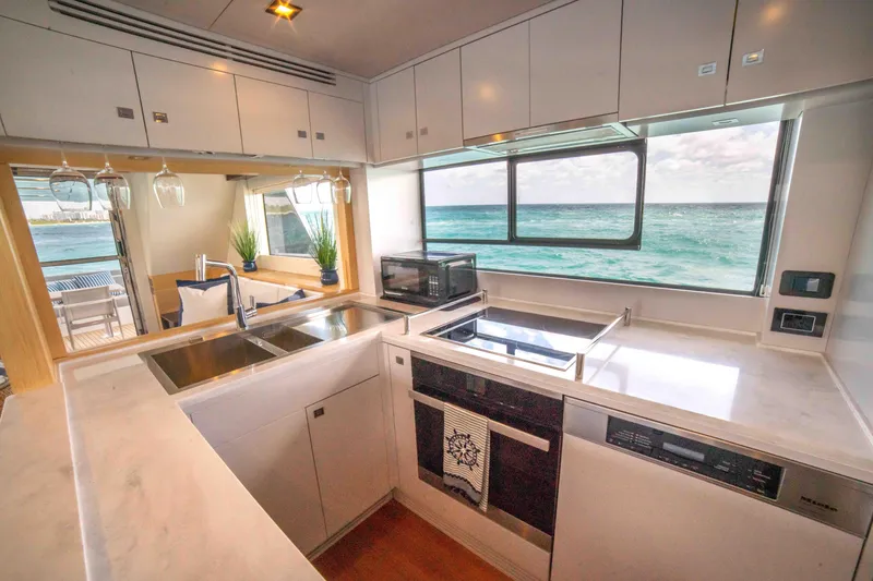 Slide: The Image of Modern kitchen in 2018 Sirena 64 yacht with ocean view. - 37
