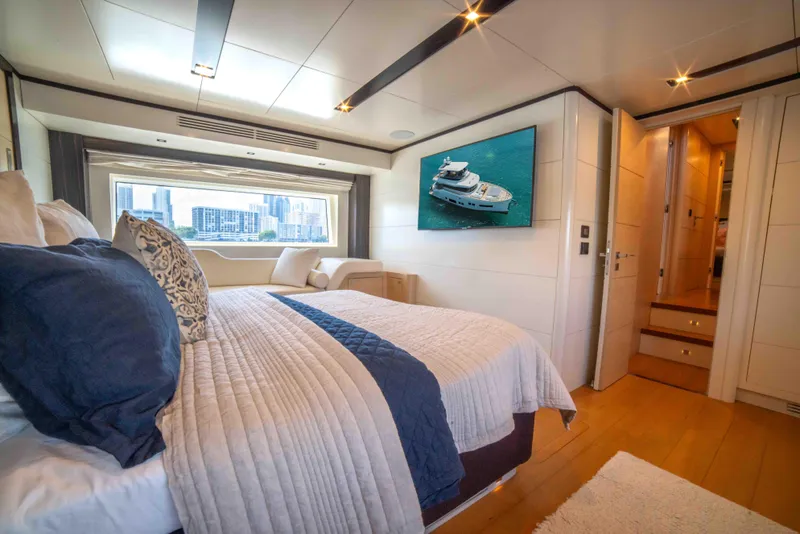 Slide: The Image of Luxurious bedroom interior of 2018 Sirena 64 yacht with city view. - 45