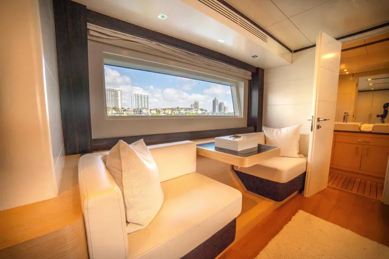 Slide: The Image of Luxurious interior of 2018 Sirena 64 yacht with cityscape view through window. - 47