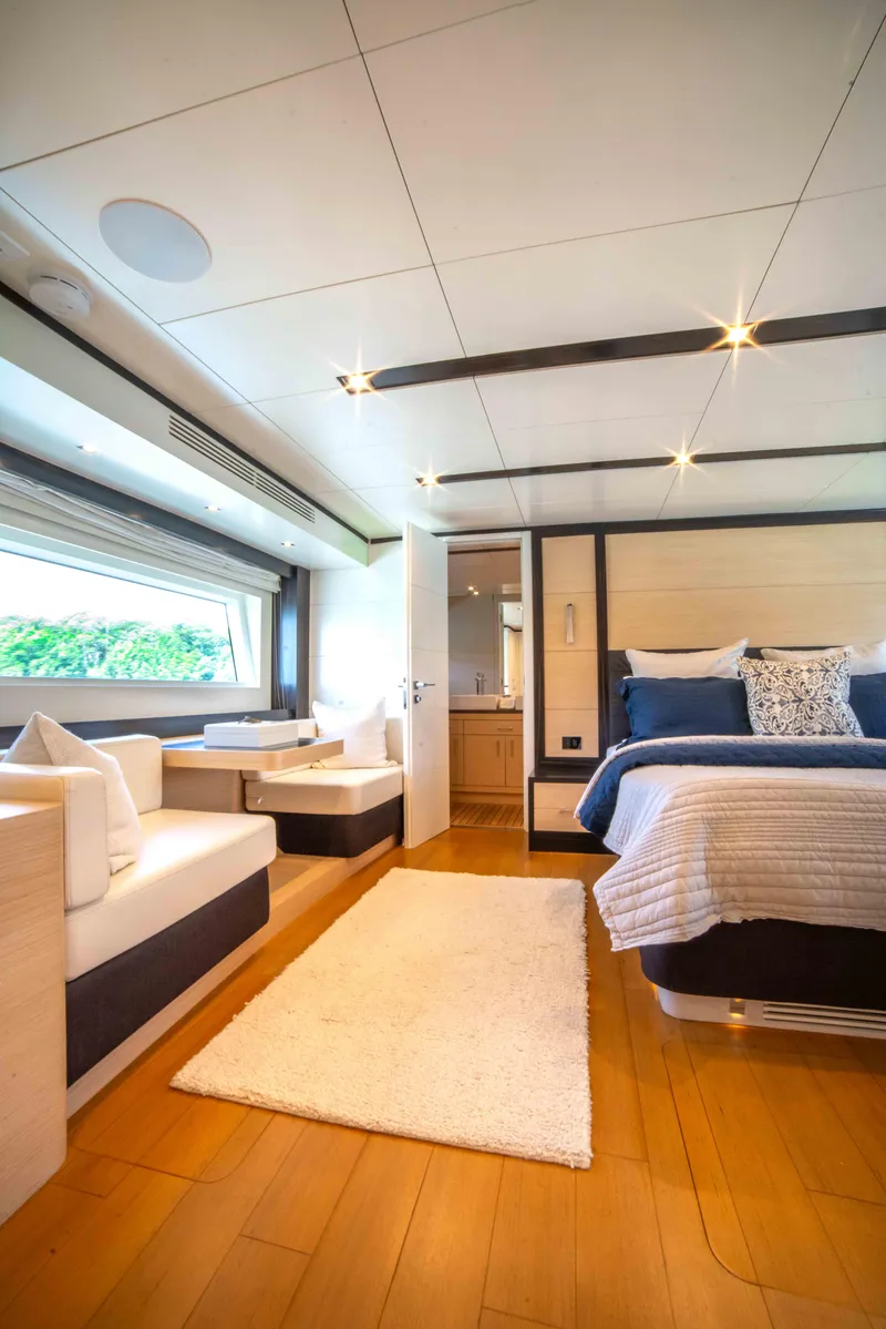 Slide: The Image of Luxurious interior of 2018 Sirena 64 yacht with modern bedroom and seating area. - 48