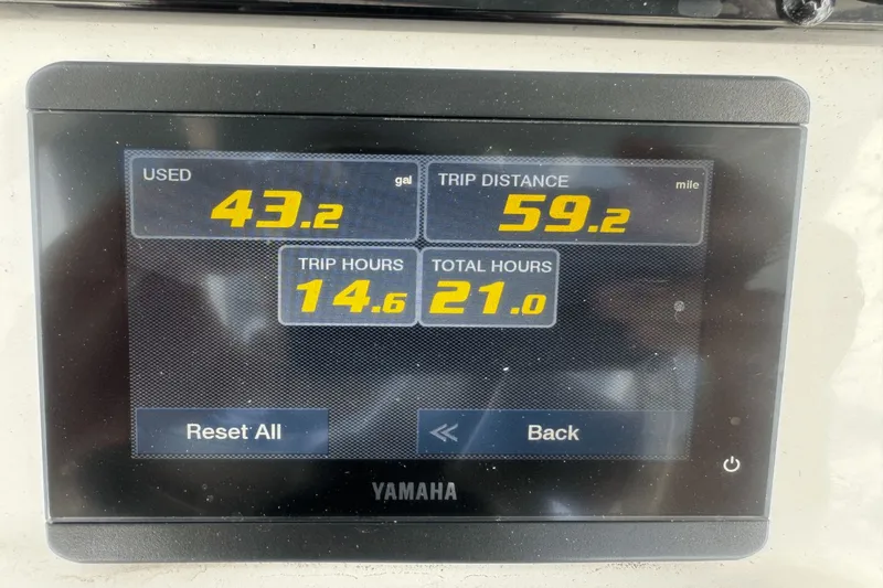 Slide: The Image of Display screen showing fuel usage, trip distance, and hours for 2023 Sea Hunt 234 Ultra. - 19