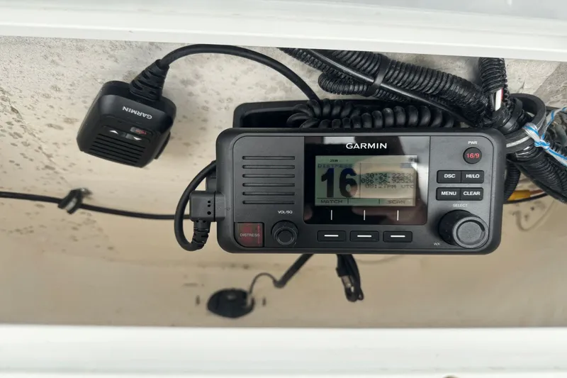 Slide: The Image of Garmin marine radio installed on 2023 Sea Hunt 234 Ultra boat. - 22