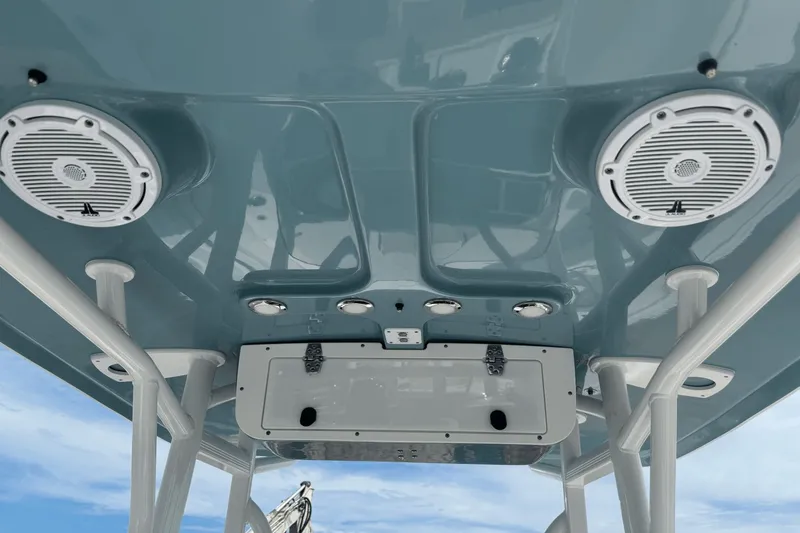 Slide: The Image of 2023 Sea Hunt 234 Ultra boat roof with speakers and storage compartment. - 23