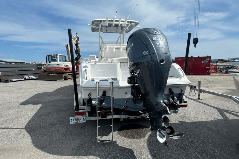 Slide: The Image of 2023 Sea Hunt 234 Ultra boat with Yamaha 250 V6 engine on a trailer. - 4