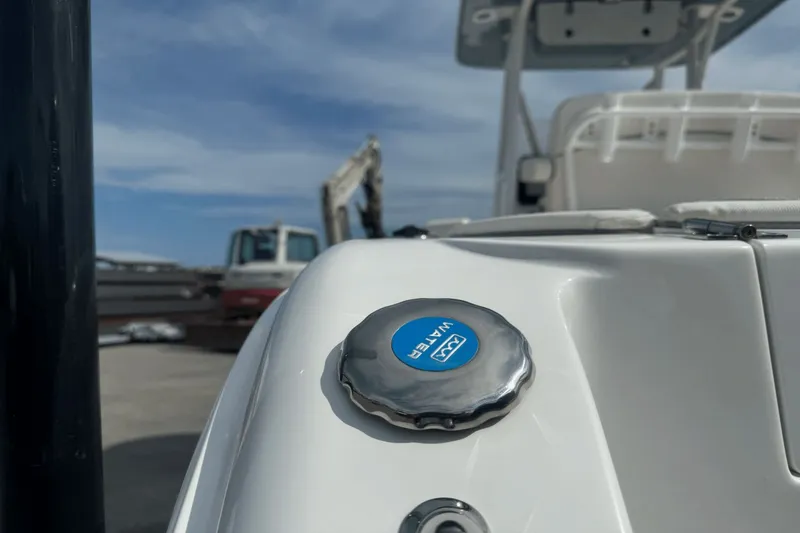 Slide: The Image of 2023 Sea Hunt 234 Ultra boat water cap, close-up view. - 9