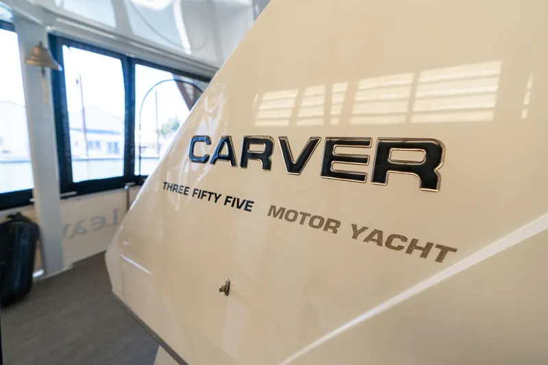 Slide: The Image of 1998 Carver 355 Aft Cabin Motor Yacht interior with logo detail. - 45