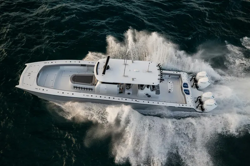 The Image of Aerial view of 2026 Freeman 47LX boat speeding on the ocean. - 1