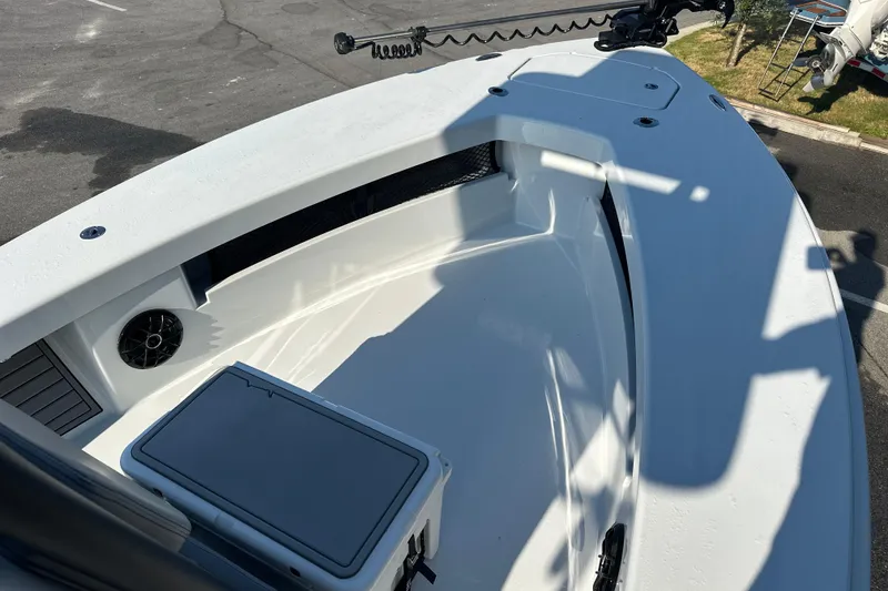 Slide: The Image of 2025 East Cape 25 Open boat deck with storage and speaker. - 16