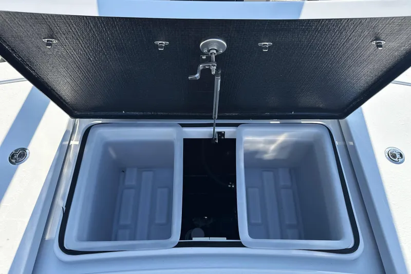 Slide: The Image of Open storage compartment on 2025 East Cape 25 Open boat. - 21