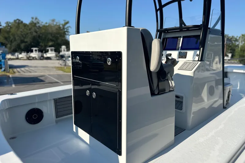 Slide: The Image of 2025 East Cape 25 Open boat interior with modern console and seating. - 31