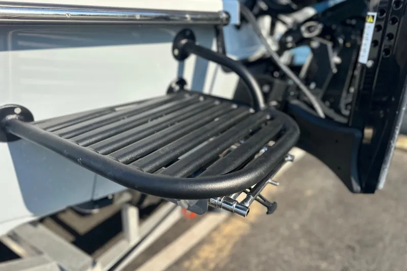 Slide: The Image of Close-up of 2025 East Cape 25 Open boat's black metal step detail. - 33