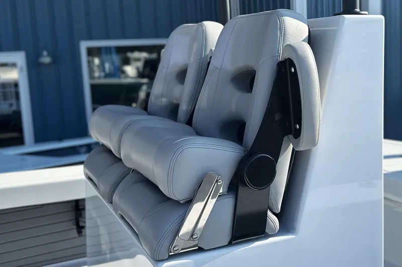 Slide: The Image of 2025 East Cape 25 Open boat seats, featuring sleek gray upholstery and modern design. - 36