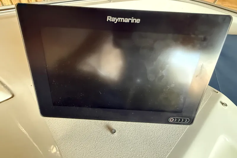Slide: The Image of Raymarine display on 2000 Bayliner 3988 Command Bridge Motoryacht dashboard. - 22