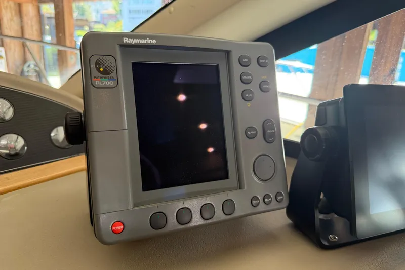 Slide: The Image of Raymarine Pathfinder RL70C display on 2000 Bayliner 3988 Command Bridge Motoryacht dashboard. - 23