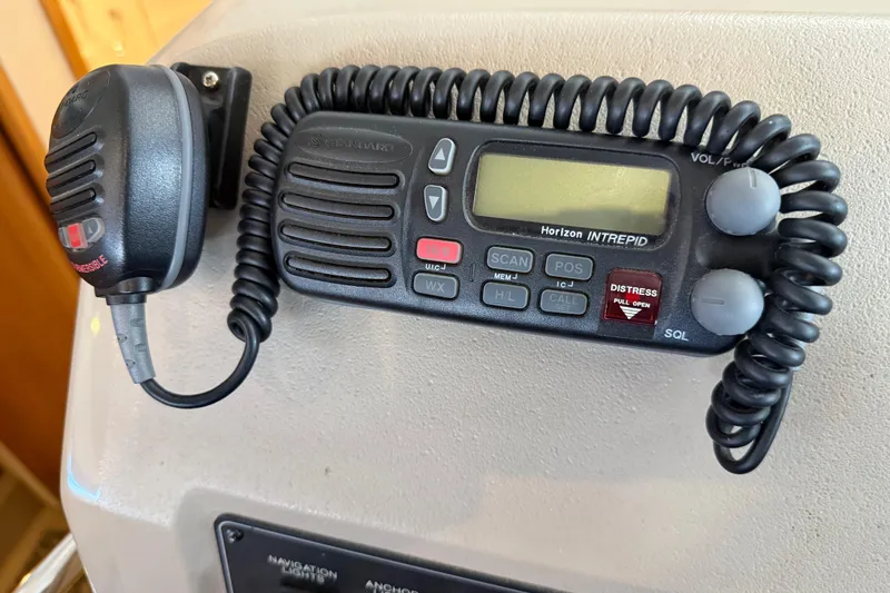 Slide: The Image of VHF radio on 2000 Bayliner 3988 Command Bridge Motoryacht dashboard. - 25