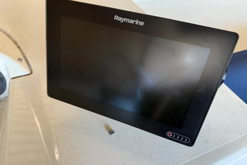 Slide: The Image of Raymarine display on 2000 Bayliner 3988 Command Bridge Motoryacht dashboard. - 58