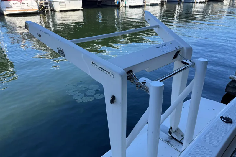 Slide: The Image of White boat davit on a 2000 Bayliner 3988 Command Bridge Motoryacht at a marina. - 74