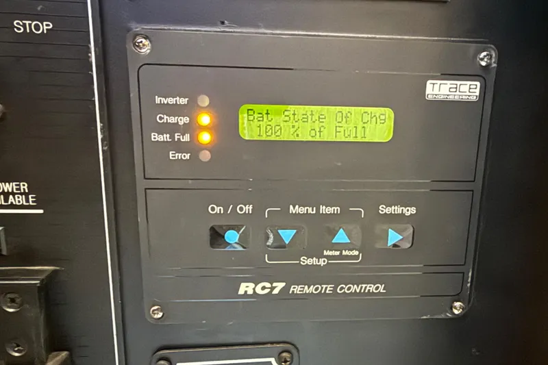 Slide: The Image of Control panel of a 2000 Bayliner 3988 Command Bridge Motoryacht showing battery status. - 9