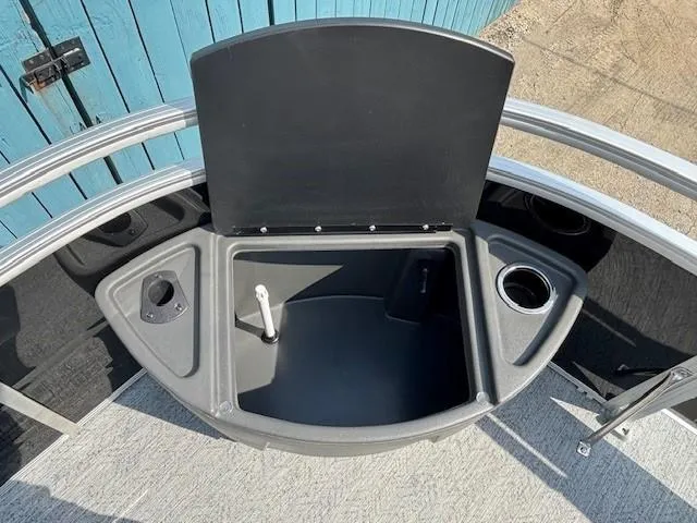 Slide: The Image of 2026 Sun Tracker Fishin' Barge 20 DLX livewell with cup holders and storage compartments. - 12