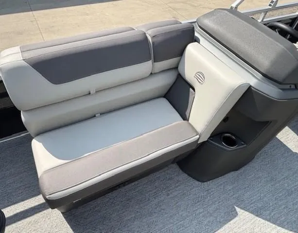Slide: The Image of 2026 Sun Tracker Fishin' Barge 20 DLX boat seat with gray and beige upholstery. - 13