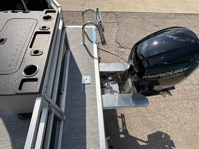 Slide: The Image of 2026 Sun Tracker Fishin' Barge 20 DLX with Mercury outboard motor, top view. - 29