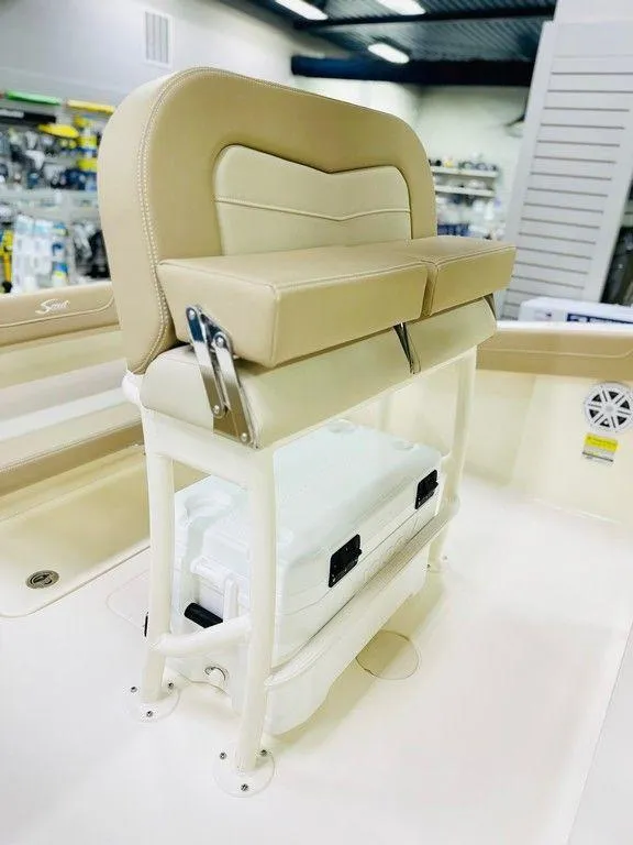 Slide: The Image of 2026 Scout 215 XSF boat seat with storage compartment underneath. - 2
