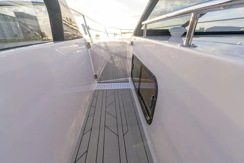 Slide: The Image of Sleek deck of 2025 Hanover 387 yacht with modern design and railing. - 14