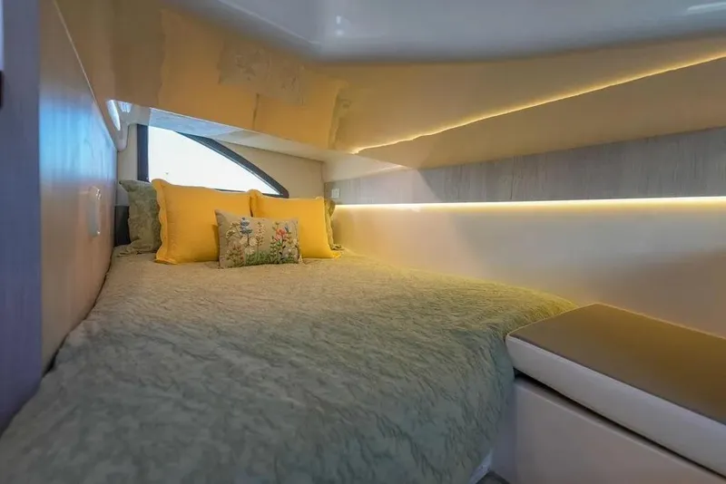 Slide: The Image of Luxurious cabin interior of 2025 Hanover 387 yacht with cozy bedding and ambient lighting. - 20
