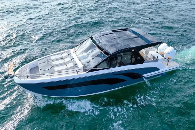 Slide: The Image of Luxury Hanover 387 yacht cruising on open water, 2025 model. - 5