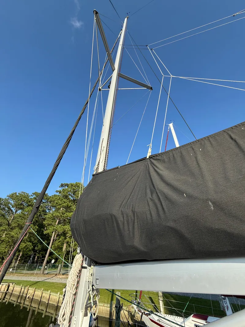 Slide: The Image of Sailboat mast and rigging of 2010 Leopard 38 under clear blue sky. - 22