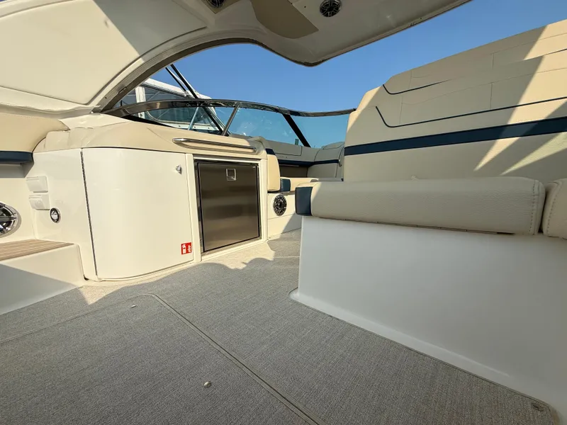 Slide: The Image of 2024 Formula 350 Crossover Bowrider interior with seating and storage, showcasing luxury design. - 12