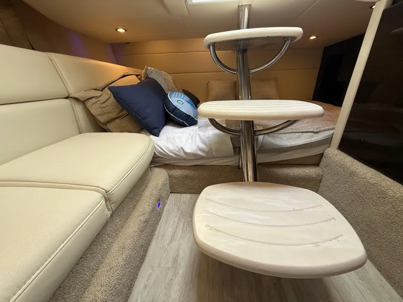 Slide: The Image of 2024 Formula 350 Crossover Bowrider cabin with cozy seating and modern interior design. - 36