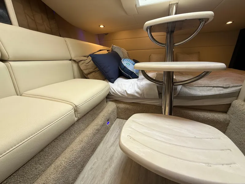 Slide: The Image of 2024 Formula 350 Crossover Bowrider interior with beige seating and modern design. - 38