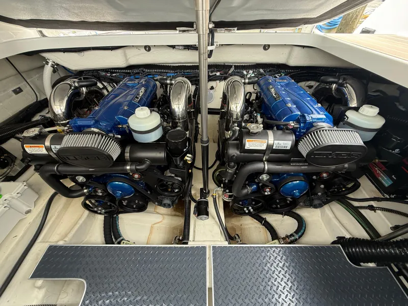 Slide: The Image of 2024 Formula 350 Crossover Bowrider engine compartment with dual blue engines. - 42