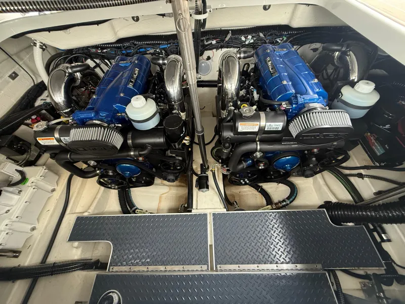Slide: The Image of 2024 Formula 350 Crossover Bowrider engine compartment with dual blue engines. - 43