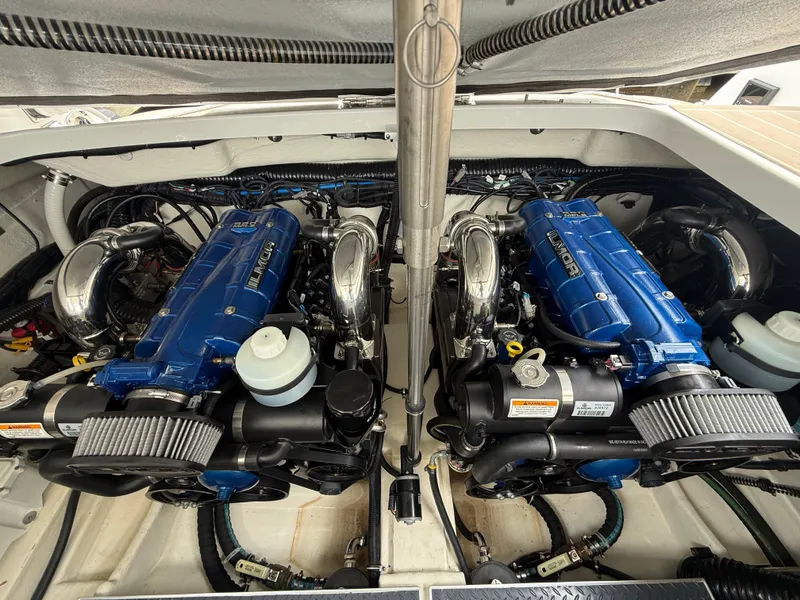 Slide: The Image of 2024 Formula 350 Crossover Bowrider engine compartment with dual blue engines. - 46