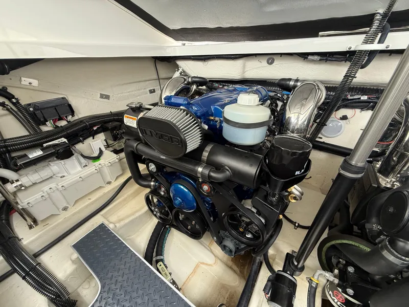 Slide: The Image of 2024 Formula 350 Crossover Bowrider engine compartment with modern components and wiring. - 47
