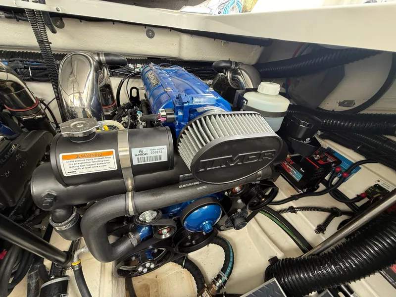 Slide: The Image of 2024 Formula 350 Crossover Bowrider engine compartment with Ilmor engine components. - 49