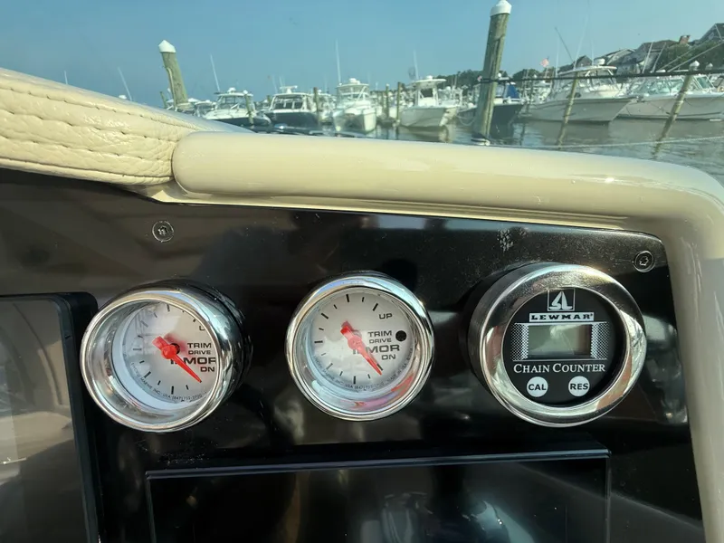 Slide: The Image of Dashboard of 2024 Formula 350 Crossover Bowrider with gauges and chain counter. - 50