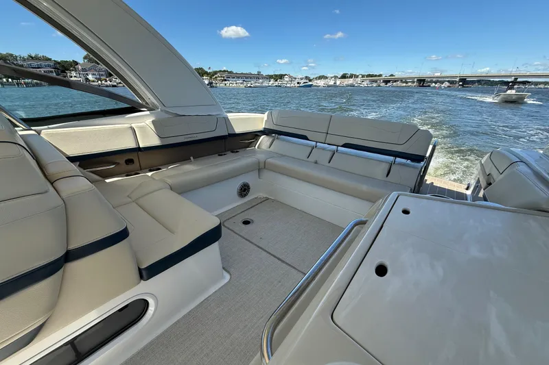 Slide: The Image of 2024 Formula 350 Crossover Bowrider interior with luxurious seating on open water. - 64