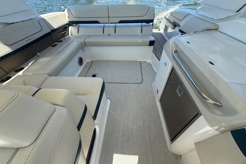 Slide: The Image of 2024 Formula 350 Crossover Bowrider interior with luxurious seating and modern amenities. - 68