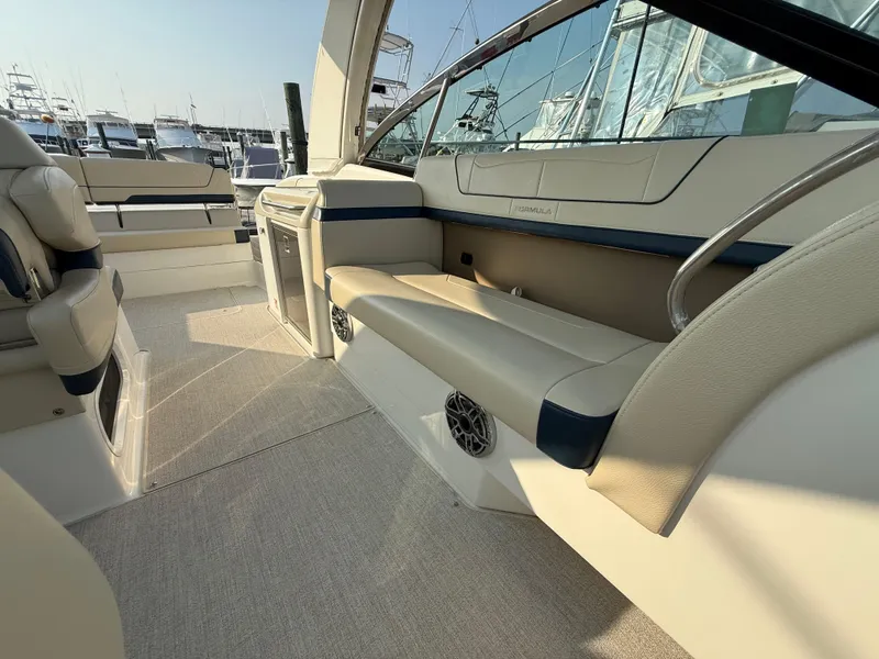 Slide: The Image of 2024 Formula 350 Crossover Bowrider interior with luxurious seating and modern design. - 8