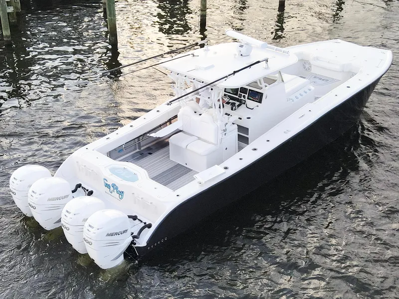 Slide: The Image of 2021 Tag 360 Catamaran with four Mercury engines on water. - 6