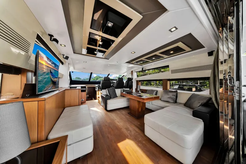 Slide: The Image of Luxurious interior of 2012 Sunseeker 74 Sport Yacht with modern furnishings and large windows. - 17