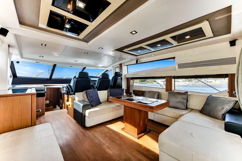 Slide: The Image of Luxurious interior of 2012 Sunseeker 74 Sport Yacht with modern seating and panoramic windows. - 19
