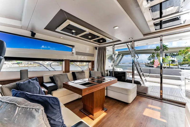 Slide: The Image of Luxurious interior of 2012 Sunseeker 74 Sport Yacht with modern furnishings and ocean view. - 20