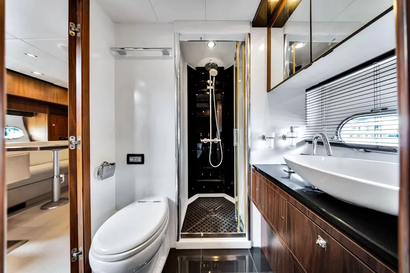 Slide: The Image of Luxurious bathroom in 2012 Sunseeker 74 Sport Yacht with modern fixtures and elegant design. - 26