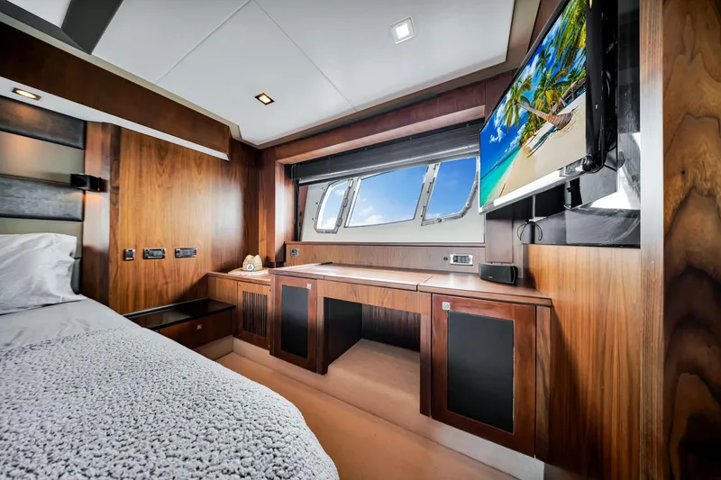Slide: The Image of Luxurious cabin interior of 2012 Sunseeker 74 Sport Yacht with wood finish and ocean view. - 35